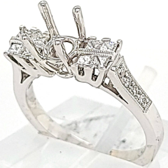 18 Karat Engagement Ring | Round Diamonds 0.12cts | Princess Cut Diamonds 0.44cts